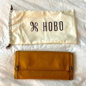 Yellow soft leather Hobo wallet.
